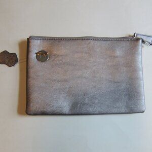 Grey leather clutch bag with tag still attached.